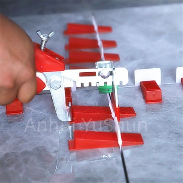 Materiali arancio neri di livellamento degli strumenti pp di colore del pavimento della parete del sistema degli accessori 2mm delle mattonelle per la posizione delle mattonelle